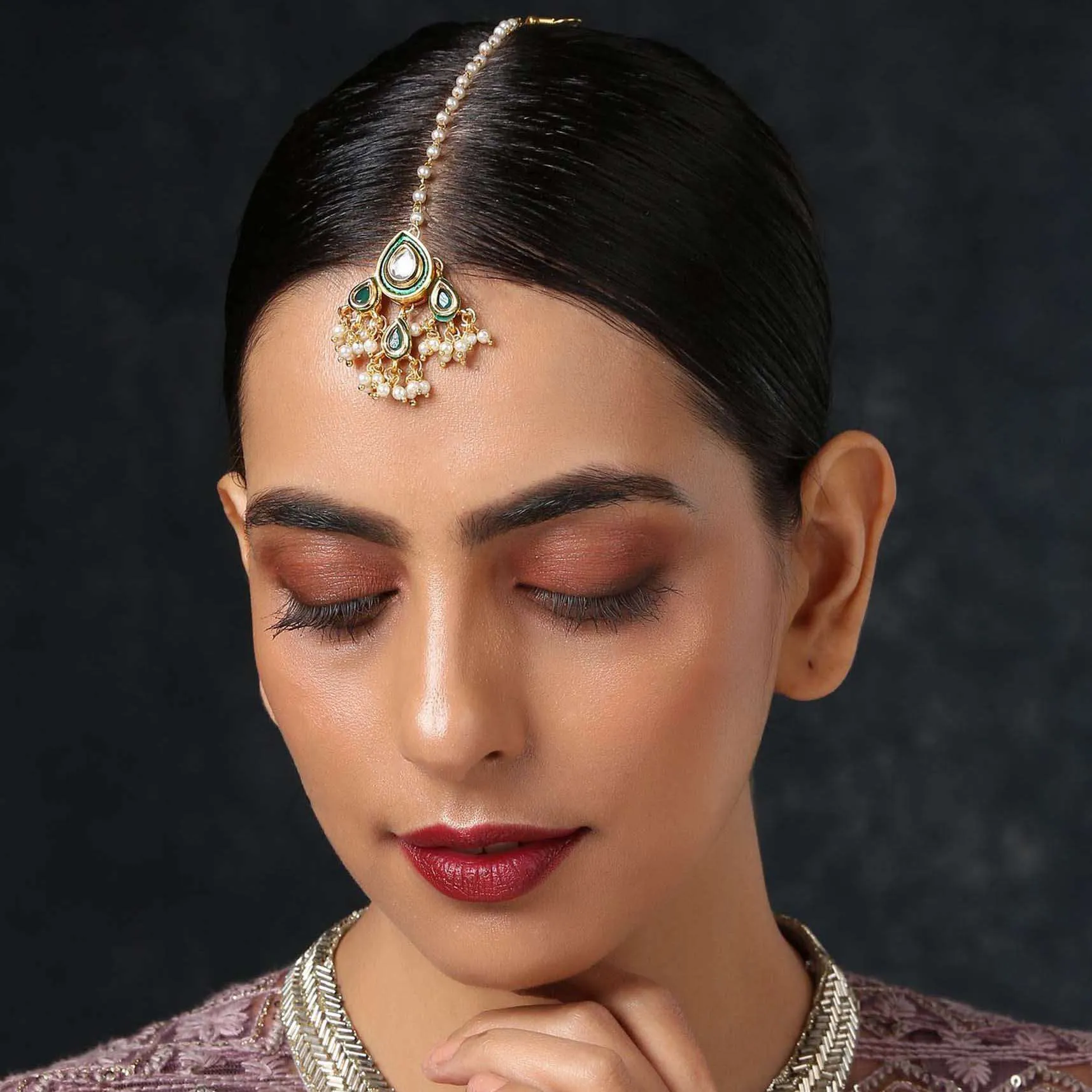 Gold Mangtika In A Classy Combination Of Green And Gold Kundan And Pearls