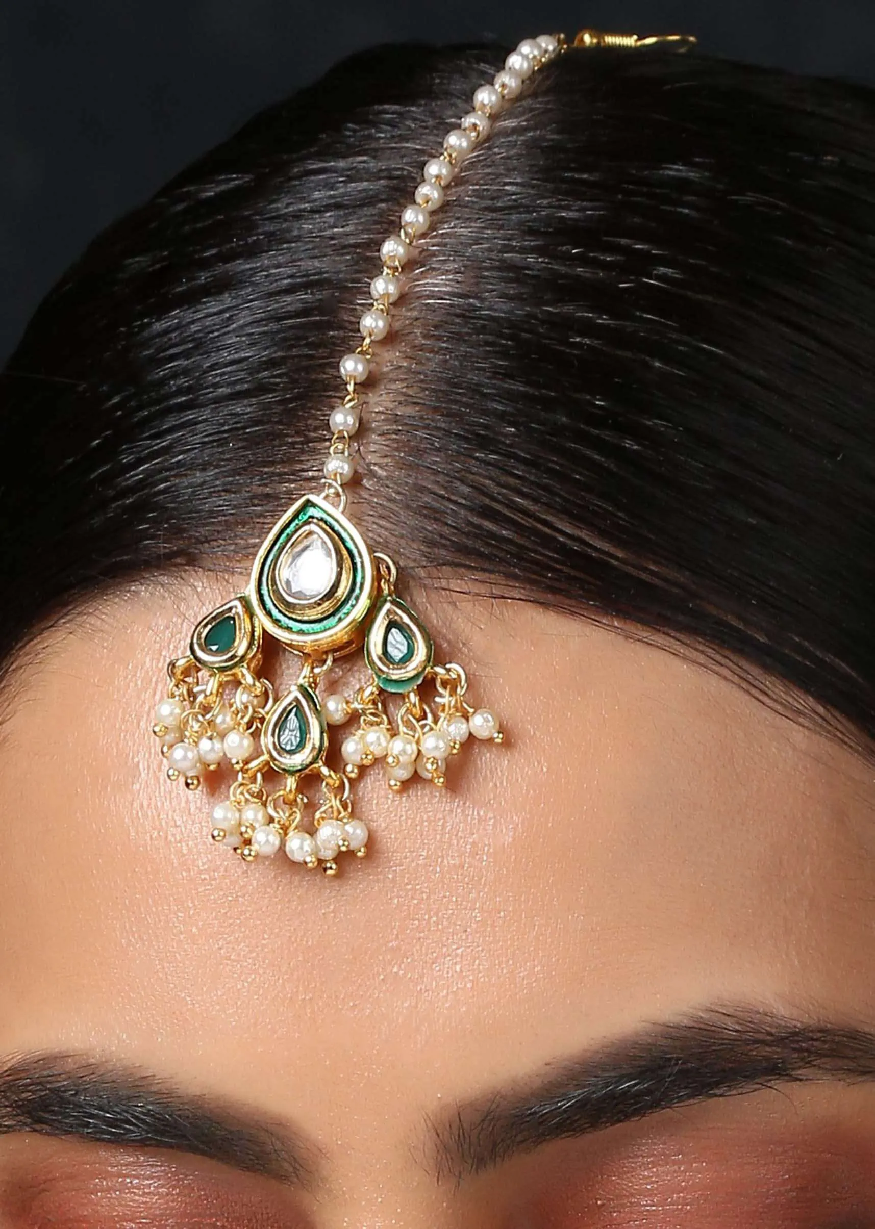 Gold Mangtika In A Classy Combination Of Green And Gold Kundan And Pearls