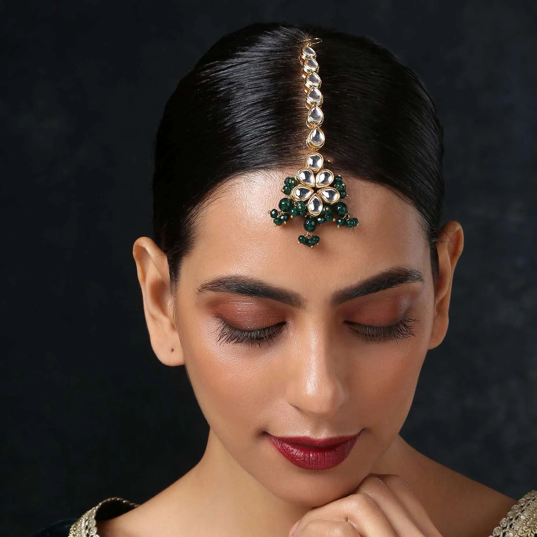 Gold Mangtika With Of Green Stones And Gold Kundan In A Classy Combination