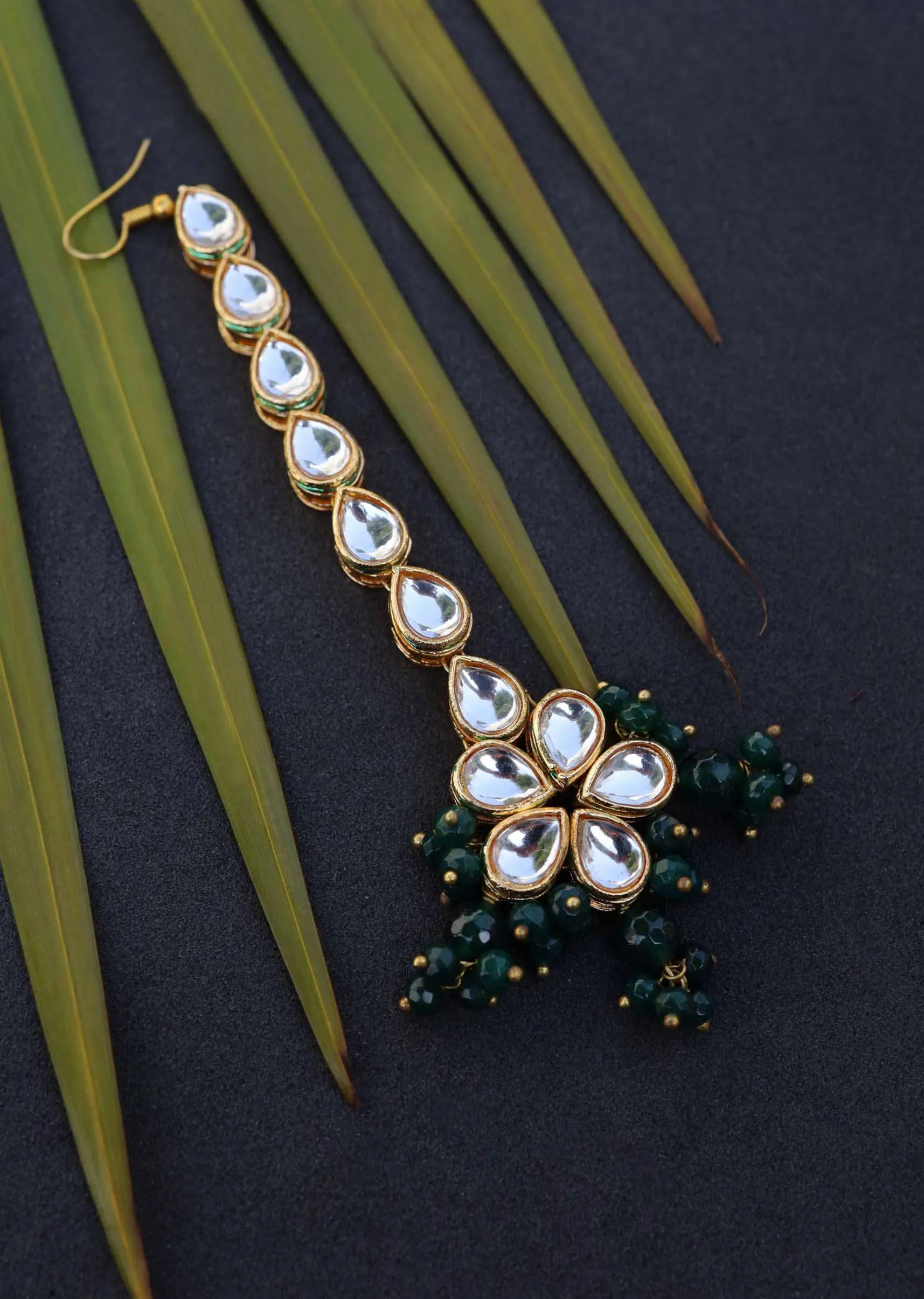 Gold Mangtika With Of Green Stones And Gold Kundan In A Classy Combination